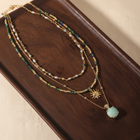 Collier superposé plaqué or 18 carats avec pendentif soleil, style bohème, perles d'amazonite naturelle, ras-de-cou empilable, bijoux de plage en pierre bleue pour femme