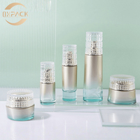 Flacons de soin en verre aqua dégradé argenté de 30 ml, 35 ml, 100 ml, 120 ml avec couvercles en grille de cristal pour essence, huile pour le visage, base de maquillage