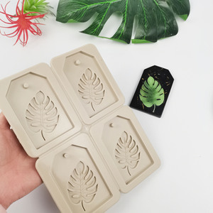 <span class=keywords><strong>Moule</strong></span> en <span class=keywords><strong>silicone</strong></span> à <span class=keywords><strong>4</strong></span> cavités en forme de feuille de Monstera pour cire aromatique, résine, étiquettes et décoration de gâteaux - Product Image 2