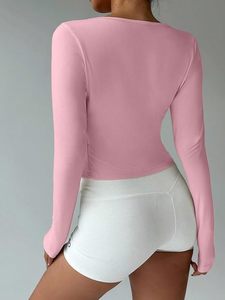 Haut de yoga sexy rose à manches longues pour femme, en tricot de spandex, avec encolure en V, à nouer sur le devant, sans couture, pour le fitness et l'entraînement en salle de sport - Product Image 3