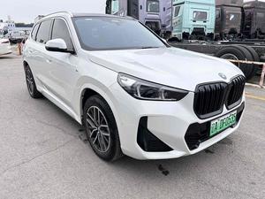 [No.25 <span class=keywords><strong>BMW</strong></span> 009] 2024 d'occasion <span class=keywords><strong>BMW</strong></span> IX1 <span class=keywords><strong>X</strong></span> Drive 25L <span class=keywords><strong>X</strong></span> Edition Blanc de Uniland Motors Voiture d'occasion SUV en Chine Bon état - Product Image 3