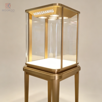 Vitrine moderne en verre et acier inoxydable avec éclairage LED et design rotatif pour magasin de détail