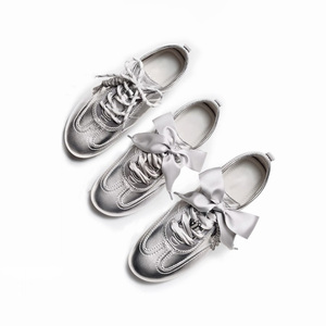 Baskets rétro décontractées pour femmes en cuir souple à semelle souple, style Forrest Gump, à lacets, plates, nouvelle collection printemps 2026 - Product Image 1