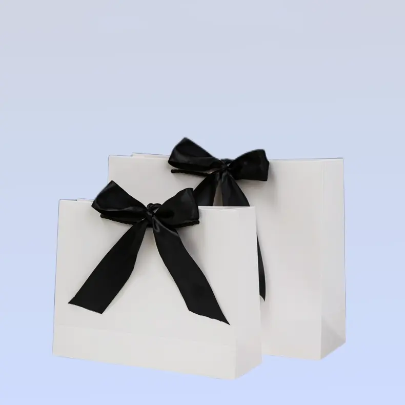 Logotipo personalizado joias de luxo compras pequeno embalagem de papel com alça fita saco de presente