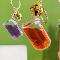 Huile acrylique dans une bouteille d'eau porte-clés porte-clés mignon créatif sac pendentif Quicksand flottant glaçon bouteille porte-clés liquide