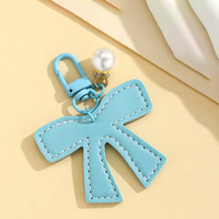 Porte-clés en cuir PU avec nœud pour décorations de fête Coquette, pendentif élégant en forme de nœud, cadeaux pour la salle de classe et usage quotidien