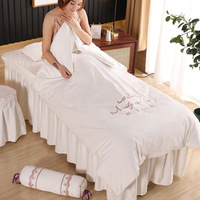 Ensemble de draps de lit de salon de beauté en polaire tricoté quatre pièces avec couverture de table de massage spa, couvre-oreiller et housses de siège
