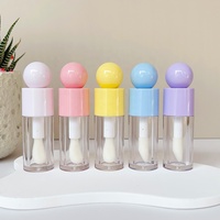 JIEMEI Nuevo Diseño en Stock, Botella de Brillo Labial Vacía de 4ML con Tapa en Forma de Bola, Logotipo Personalizado, Brocha Grande, Tubo de Brillo Labial Redondo y Grueso Único