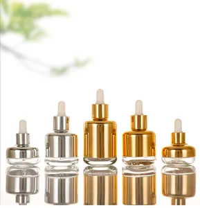 Luxury 20ml 30ml 50ml 1oz Gold And Silver Shoulder Glass Serum Essential Oil Glass Bottles With Pump Dropper Pipette
