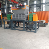 Déchiqueteuse de pneus à double arbre, entièrement automatique, haute efficacité, respectueuse de l'environnement, pour pneus entiers, fabriquée en Chine