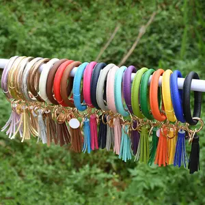 Pulseira com borla para chaveiro, venda quente, pulseira de couro com pulseira de borla, porta-chaves para mulheres e meninas