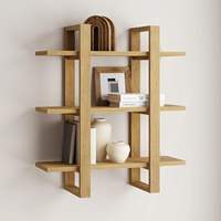Étagère murale en bois massif multi-niveaux pour le rangement, la décoration et l'affichage d'objets variés dans le salon ou la chambre
