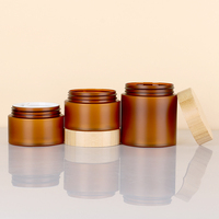 Récipient d'emballage pour crème au beurre corporel Bouteilles d'emballage 150ml 250ml Ambre Cosmétique pour animaux de compagnie 5oz 8oz Pot en plastique PET avec bouchon à vis Couvercle en bambou