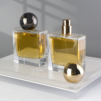 Flacon de parfum haut de gamme brillant avec bouchon en zamac, 30ml 50ml 100ml, en verre transparent poli avec atomiseur carré