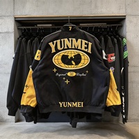 Blouson universitaire de course noir et jaune, style streetwear, broderie personnalisée, blouson bomber style course, fabricant OEM ODM