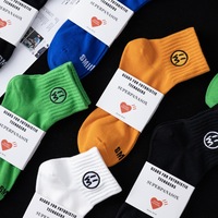 Chaussettes mi-mollet en coton pour hommes, motif visage souriant, broderie tendance, basses, corset, respirantes et absorbant la transpiration, pour le sport