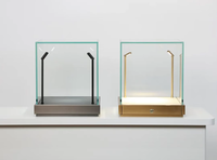 Vitrine de comptoir en verre trempé avec base en acier inoxydable et éclairage LED pour les bijouteries