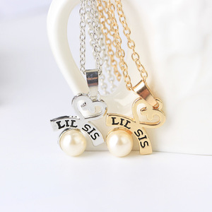 DS Little Big Sister Fashion Collier à pendentif en or et argent avec perle creuse Collier élégant et élégant pour femmes - Product Image 1