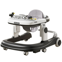 Trotteur Andador multifonctionnel 4-en-1 avec 6 roues, cadre en plastique pliable pour l'apprentissage assis-debout.