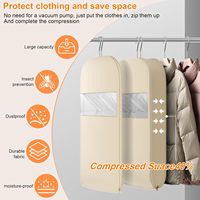 Sac à vêtements suspendu épais anti-poussière avec technologie de compression automatique par fermeture éclair pour un gain de place dans la garde-robe et le rangement en voyage