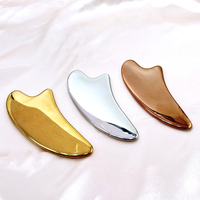 Planche Gua Sha en acier inoxydable 304 en forme de corne de bœuf, design incurvé, pour lifter la texture de la peau, réduire les ridules, outil de soin corporel