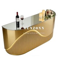 Comptoir de bar et réception moderne au design nouveau 2026, en acier inoxydable doré, tendance