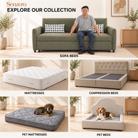 Sofa Tidur dengan Dua Bantal Sandaran Berbintik dan Platform Berlapis Kain Hijau yang Memanjang Melebihi Sandaran Tangan Samping