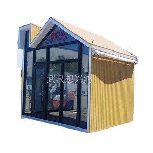 Quiosco de contenedor de diseño moderno, forma rectangular, para uso comercial, con puerta de vidrio y exterior de paneles de madera. - Product Image 1