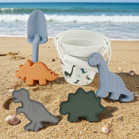 Jouets de plage d'été pour enfants, ensemble de seaux en silicone en forme de dinosaure, logo personnalisable, prix d'usine, vente en gros