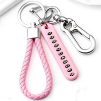 Porte-clés voiture créatif métal mâle et femelle universel corde tressée pendentif clé plaque d'immatriculation Pu porte-clés pas cher en gros