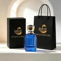 Flacon de parfum élégant en verre octogonal facetté bleu cobalt de 100 ml avec un capuchon en or luxueux pour cadeau
