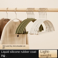 Cintre en PET recouvert de caoutchouc incurvé, sans trace, respectueux de la peau, design à épaules larges, séchoir sans couture, vente en gros