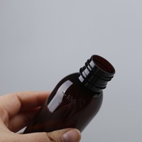 Fabricants chinois de flacons en plastique ambré pharmaceutique de 100 ml pour sirop contre la toux liquide avec gobelet