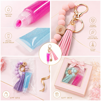 Porte-clés brillant à lèvres personnalisable avec finition brillante, rechargeable et hydratant, impression de logo en petites séries
