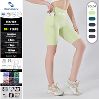 Shorts de sport taille haute pour femme avec logo personnalisé, séchage rapide, poches latérales pour téléphone, contrôle du ventre, pour yoga et gym, vente en gros