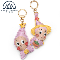 Porte-clés léger et portable en cuir véritable avec anneau métallique, logo personnalisé de haute qualité, breloque de sac mignonne et amusante, modèle Yanzhi
