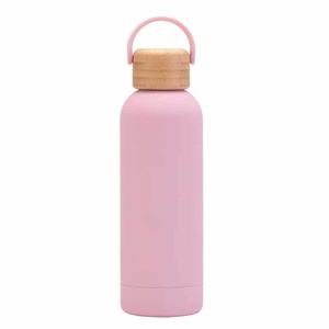 Nouvelle Bouteille d'Eau Isotherme en Acier Inoxydable 304 de 750 ml avec Couvercle en Bois de Bambou, Isolation Thermique 6-12 Heures, Design Minimaliste 2026 - Product Image 2