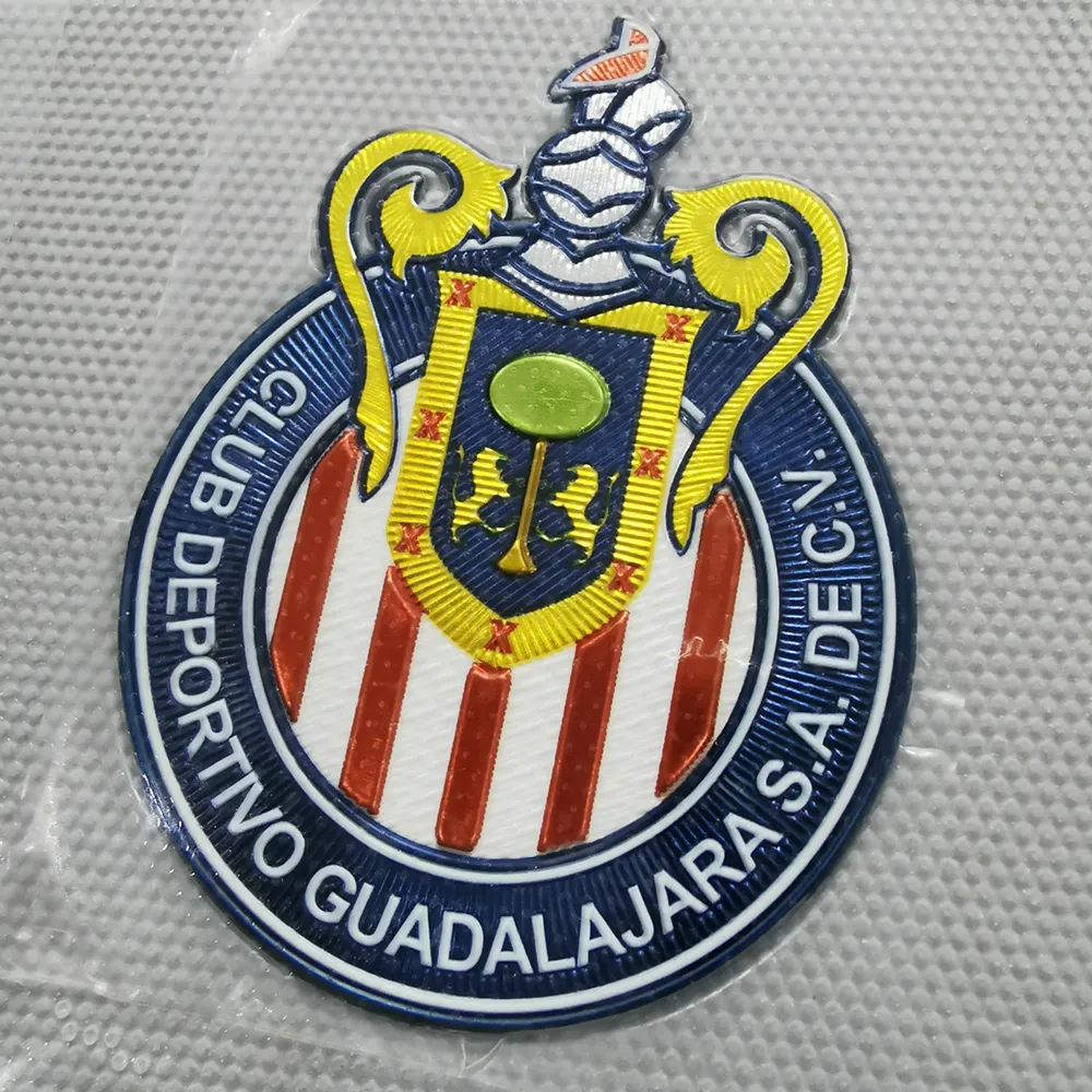 Emblema de TPU personalizado emblema plástico estilo flexível logotipo em relevo de transferência de calor camisa de futebol 3D Flexstyle Metflex emblemas de TPU macio