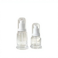 Flacon pompe rond en verre soufflé transparent 30ml 50ml avec surface givrée pour emballage de sérum cosmétique, huile essentielle, soin de la peau