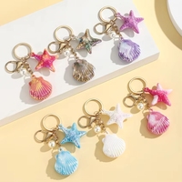 Porte-clés mignon en forme d'étoile de mer, coquillage et conque, breloque anneau vie marine pour femmes, filles, décoration à suspendre pour voiture, sac, pochette
