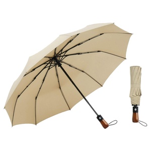 2025 Manufacturer Wholesale New 3d Design Luxury Wooden Handle Custom Umbrella logo Printing 3 Folding Umbrella Adults Windproof - Product Image 1