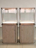Vitrine de présentation pour lunettes et bijoux de haute qualité en acier inoxydable doré avec éclairage LED et vitrine en verre étanche