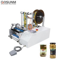 Machine d'étiquetage d'autocollant de bouteille de rouleau de bouteille semi-automatique professionnelle de haute qualité applicateur d'étiquettes de petite bouteille