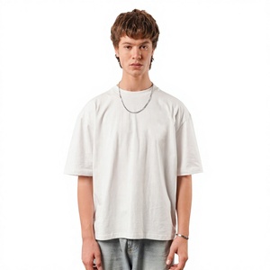 Camiseta de algodón blanca de manga corta con cuello redondo y corte holgado para hombre, estilo casual, de jersey liso, ajuste regular, longitud estándar. - Product Image 1
