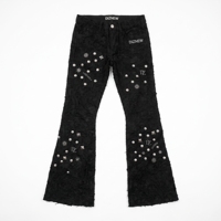 Jean homme DIZNEW noir jacquard 3D avec dentelle, texture intégrale, rivets étoile pyramide et dôme mélangés, broderie DZ DIZNEW personnalisée OEM