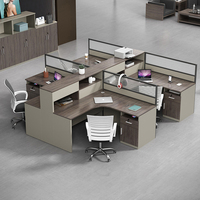 Bureau moderne pour le personnel Bureau en forme de L 4 positions Bureau d'ordinateur Écran de démarrage Table de confidentialité Poste de travail