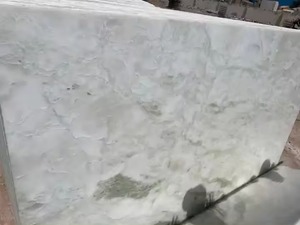 แผ่นหินอ่อนโอนิกซ์สีขาวหินธรรมชาติที่สง่างามสำหรับปูผนังและปูพื้นในโครงการที่พักอาศัย - Product Image 3