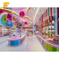 Service de conception de magasins de confiserie avec étagères murales en verre trempé sur mesure pour boutiques de détail