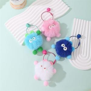 Accessoires de porte-clés en tissu rose moelleux de style pompon, yeux vifs, détails en pompon doux, vente chaude, haute qualité - Product Image 4
