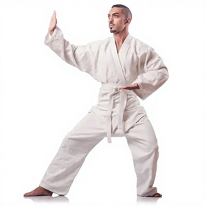 Uniforme de Karate y Taekwondo blanco de alta calidad Traje de artes marciales de algodón puro - Product Image 1